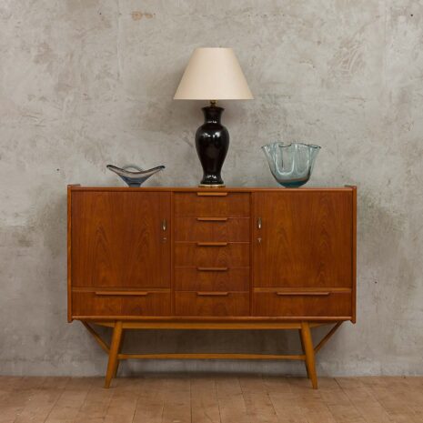 Teak sculptular highboard with seven drawers-1 Teak sculptular highboard with seven drawers