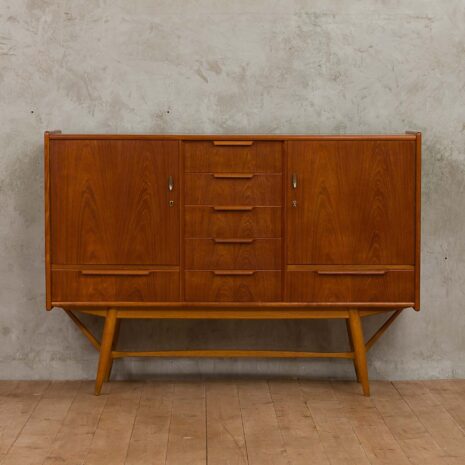 Teak sculptular highboard with seven drawers-2 Teak sculptular highboard with seven drawers