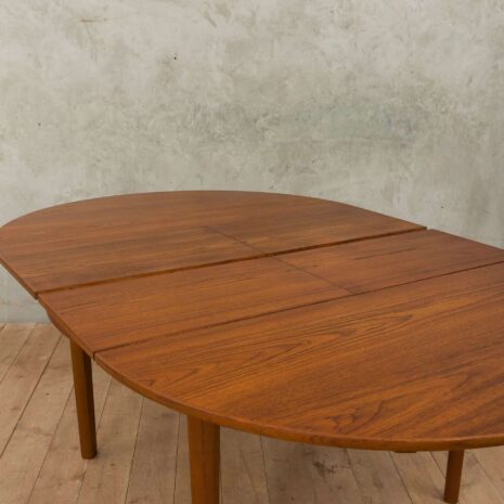 Hans Olsen style teak table with internal hide-in plates 1965-10 Hans Olsen style teak table with internal hide in plates scaled