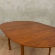 Hans Olsen style teak table with internal hide in plates   scaled