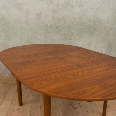 Hans Olsen style teak table with internal hide-in plates 1965-11 Hans Olsen style teak table with internal hide in plates scaled