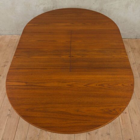 Hans Olsen style teak table with internal hide-in plates 1965-14 Hans Olsen style teak table with internal hide in plates scaled