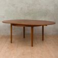 Hans Olsen style teak table with internal hide in plates   scaled