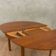 Hans Olsen style teak table with internal hide in plates   scaled