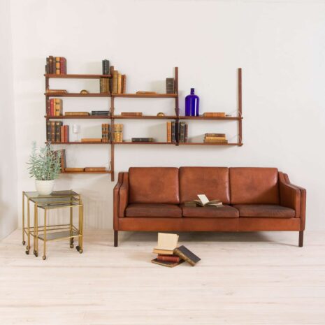 Danish modular teak wall unit with  shelves with pencil polished edges and brass hardware   scaled