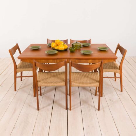 2156 Johannes Andersen style teak extension table with concealed panels-2 Johannes Andersen style teak extension table with concealed panels scaled