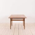 Johannes Andersen style teak extension table with concealed panels  scaled