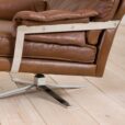 Pair of brown buffalo leather swivel lounge chairs by Aalborg Polstermobelfabrik