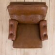 Pair of brown buffalo leather swivel lounge chairs by Aalborg Polstermobelfabrik