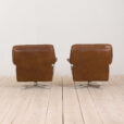 Pair of brown buffalo leather swivel lounge chairs by Aalborg Polstermobelfabrik