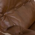 Pair of brown buffalo leather swivel lounge chairs by Aalborg Polstermobelfabrik