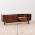 Danish Vintage sideboard in rosewood with sliding doors s Duński vintage sideboard palisandrowy z przesuwnymi drzwiczkami lata