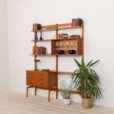 free standing wall unit teak shelving system by Kjell Ressel  scaled