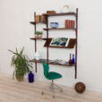 rosewood wall unit with a desk and display shelf mounted on veneered metal rails scaled