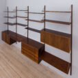 Rosewood wall unit by Hansen Guldborg  bay shelving system with  shelves and  cabinets  scaled