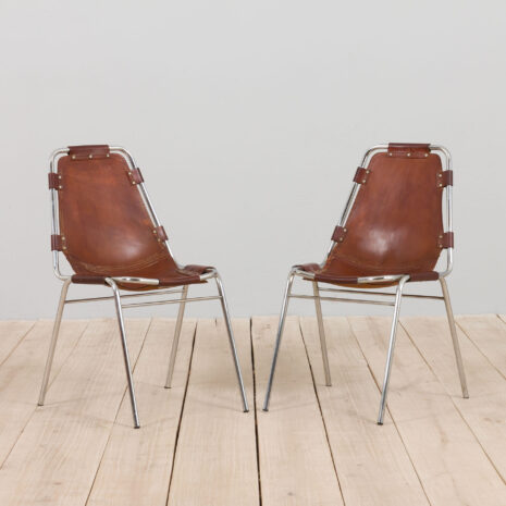 pair of Charlotte Perriand Les Arc chairs  scaled