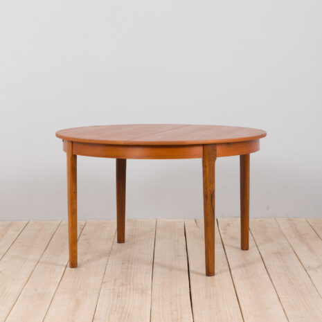 Mid century Danish Round teak extension table with hidden leaves s  scaled