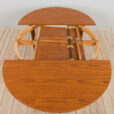 Mid century Danish Round teak extension table with hidden leaves s scaled