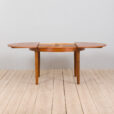 Mid century Danish Round teak extension table with hidden leaves s scaled