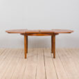 Mid century Danish Round teak extension table with hidden leaves s scaled