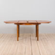 Mid century Danish Round teak extension table with hidden leaves s scaled
