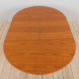 Mid century Danish Round teak extension table with hidden leaves s scaled