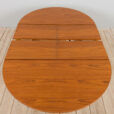 Mid century Danish Round teak extension table with hidden leaves s scaled