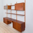 vintage three bay teak wall unit with a desk and cabinets and shelves scaled