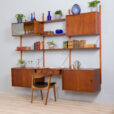 vintage three bay teak wall unit with a desk and cabinets and shelves scaled