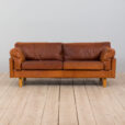 Danish two seater vintage cognac leather sofa in the style of Jorgen Gammelgaard  scaled