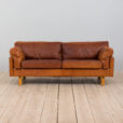 Danish two seater vintage cognac leather sofa in the style of Jorgen Gammelgaard  scaled