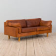 Danish two seater vintage cognac leather sofa in the style of Jorgen Gammelgaard  scaled