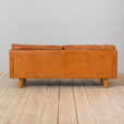 Danish two seater vintage cognac leather sofa in the style of Jorgen Gammelgaard  scaled