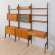Free standing  bay teak ergo wall unit with a desk  cabinets and  shelves  scaled
