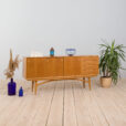 Arne Vodder style wide oak sideboard on light base with  drawers  scaled