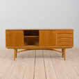 Arne Vodder style wide oak sideboard on light base with  drawers  scaled