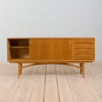 Arne Vodder style wide oak sideboard on light base with  drawers  scaled