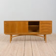Arne Vodder style wide oak sideboard on light base with  drawers  scaled
