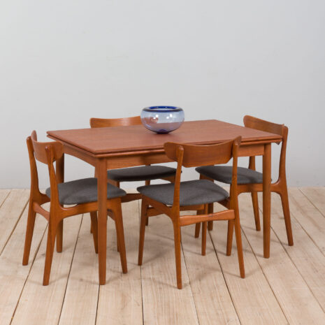 Danish teak dining table extandeble with two hidden leaves  scaled