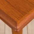 Danish teak dining table extandeble with two hidden leaves  scaled