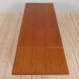 Danish teak dining table extandeble with two hidden leaves  scaled