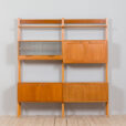 Scandinavian Rival bay free standing wall unit in teak with cabinets hidden bar cabinet and shelves scaled