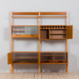 Scandinavian Rival bay free standing wall unit in teak with cabinets hidden bar cabinet and shelves scaled