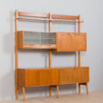 Scandinavian Rival bay free standing wall unit in teak with cabinets hidden bar cabinet and shelves scaled