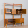 Scandinavian Rival bay free standing wall unit in teak with cabinets hidden bar cabinet and shelves scaled