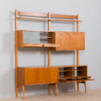 Scandinavian Rival bay free standing wall unit in teak with cabinets hidden bar cabinet and shelves scaled