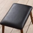 Vintage Danish Footrest stool in black leather with solid teak legs scaled