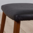 Vintage Danish Footrest stool in black leather with solid teak legs scaled