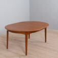 Extendable round teak dining table Model by H
