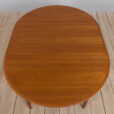 Extendable round teak dining table Model by H